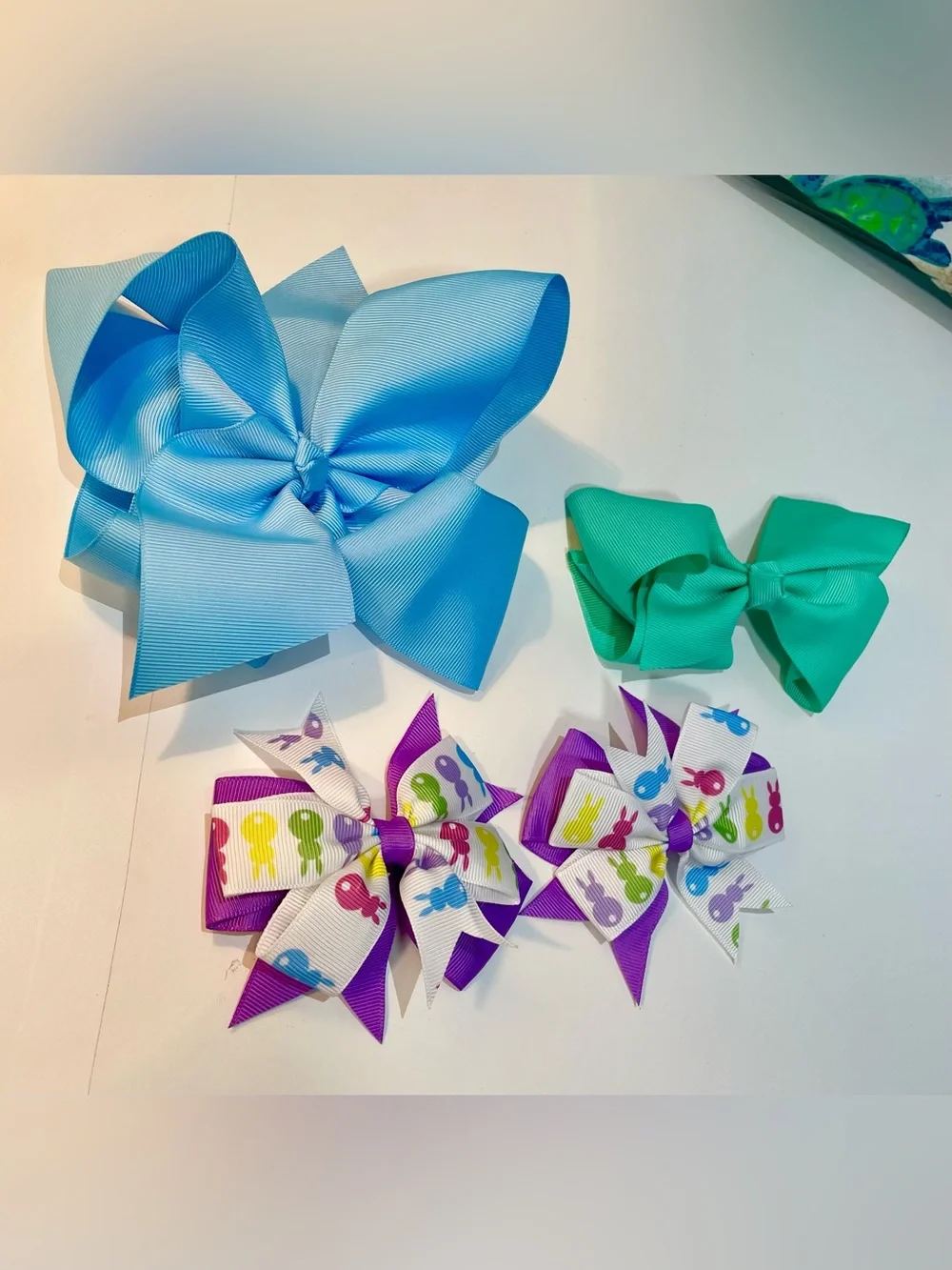 Bundle of 4 hair bows- blue, teal/aquamarine, Easter/peers